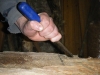 A close-up of James chiselling his hull.